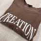 Creation Declares Your Glory Long Sleeve Tee in Espresso